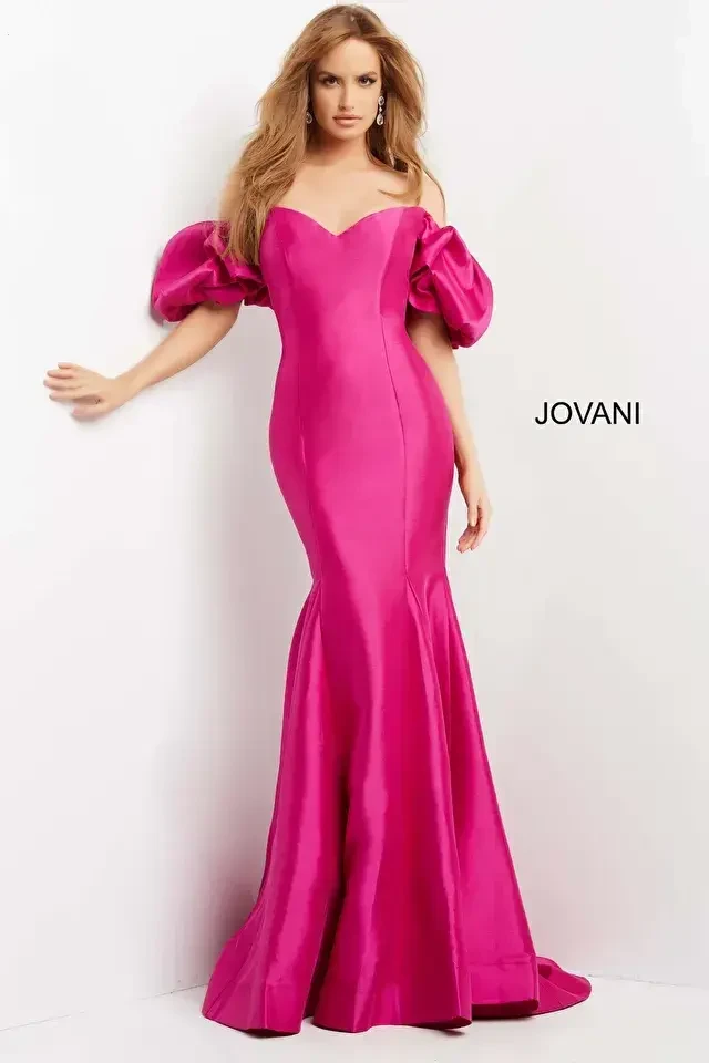 model is wearing an off the shoulder hot pink fit and flare mother of the bride evening gown