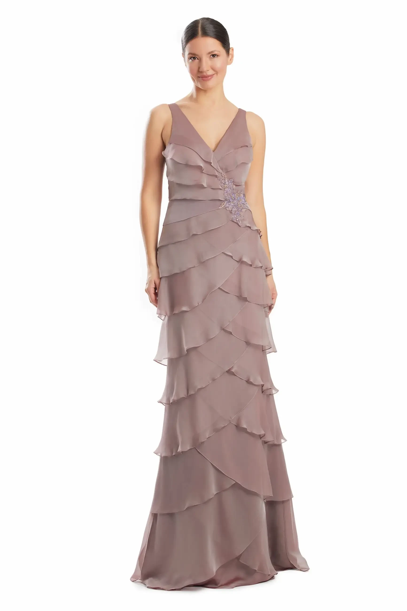 model is wearing a sleeveless mother of the bride gown with an optional shawl in frosted mocha