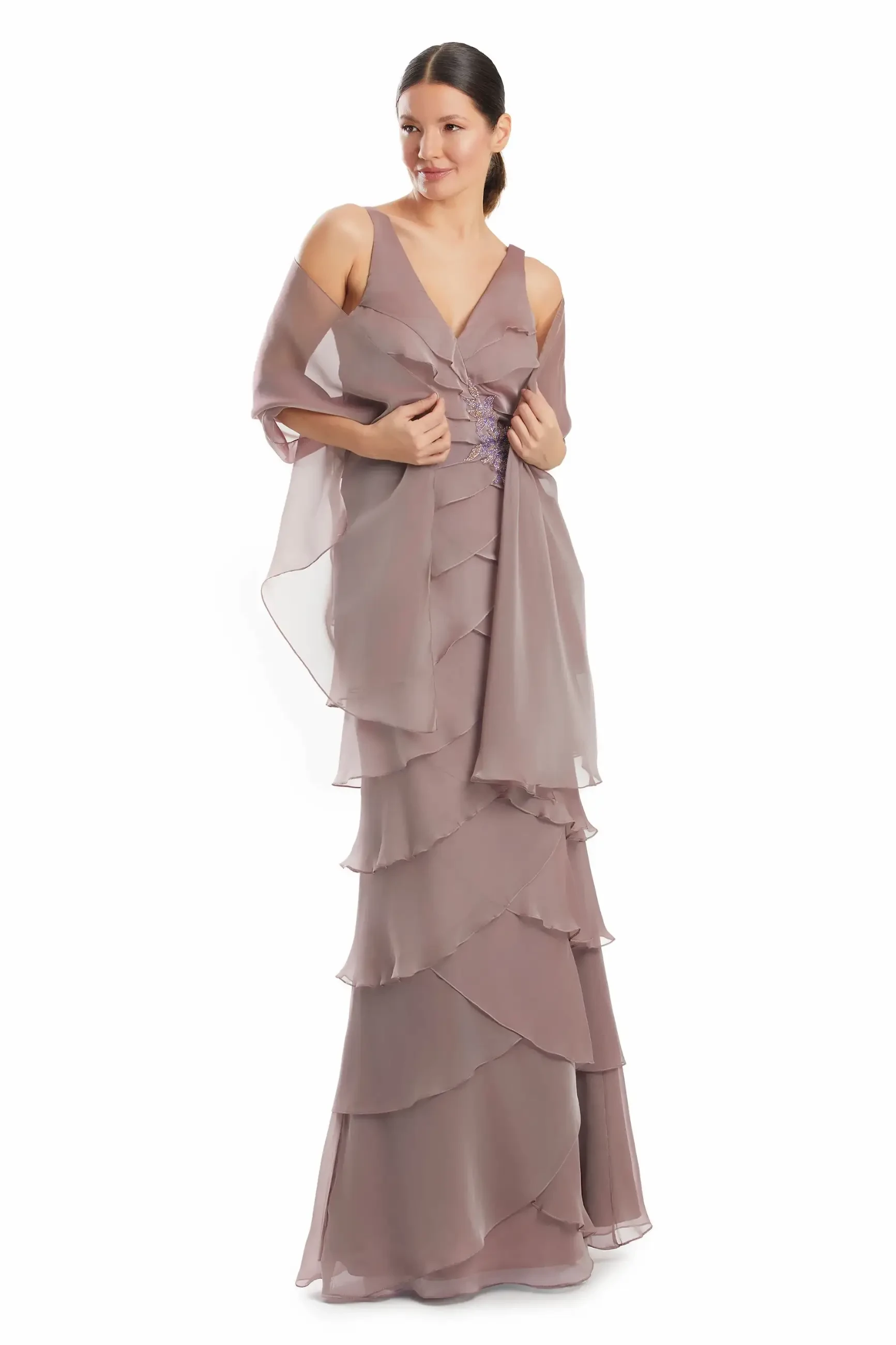 model is wearing a sleeveless mother of the bride gown with an optional shawl in frosted mocha