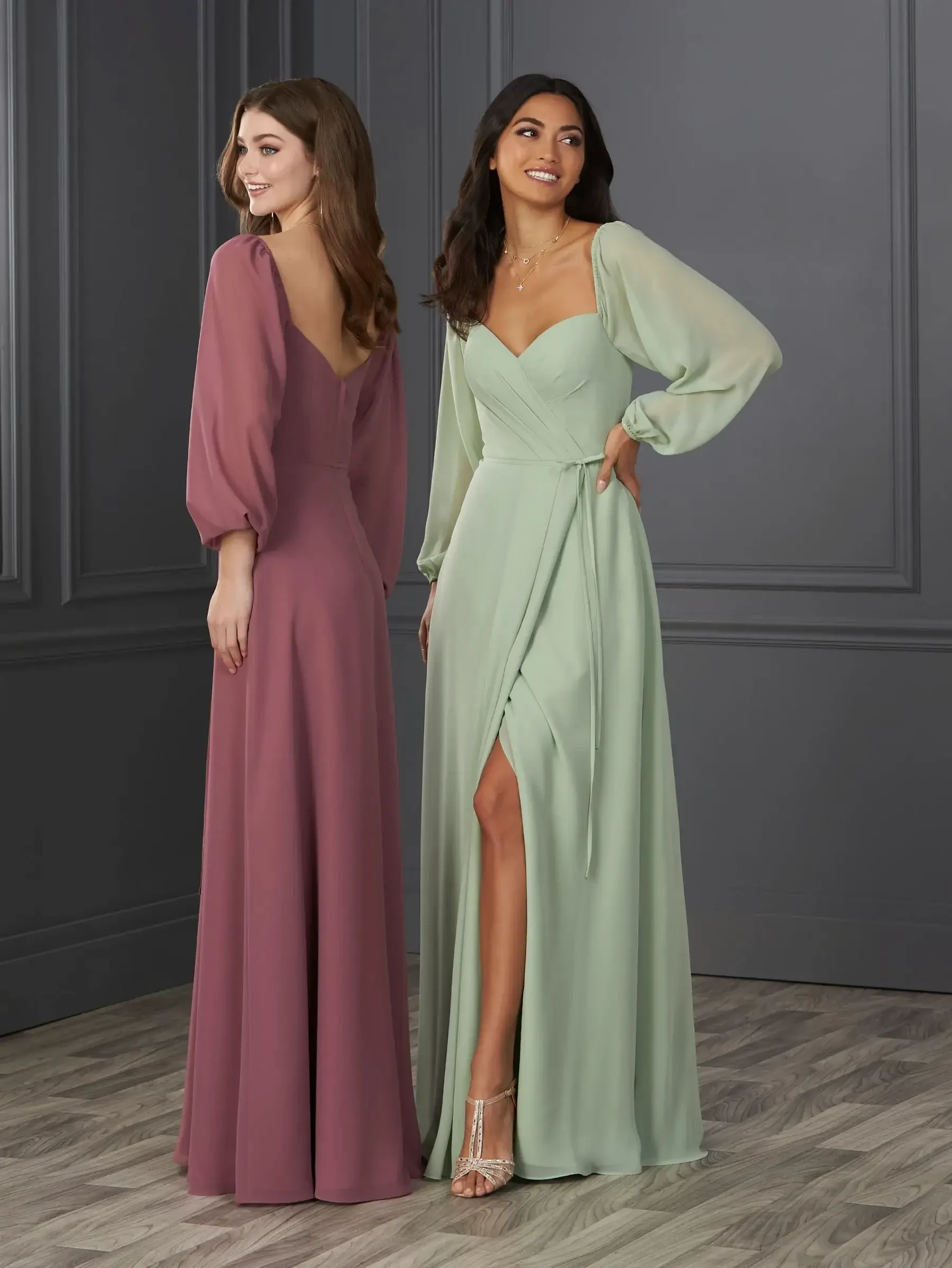 Model is wearing a long sleeve chiffon bridesmaid dress with a thigh high slit