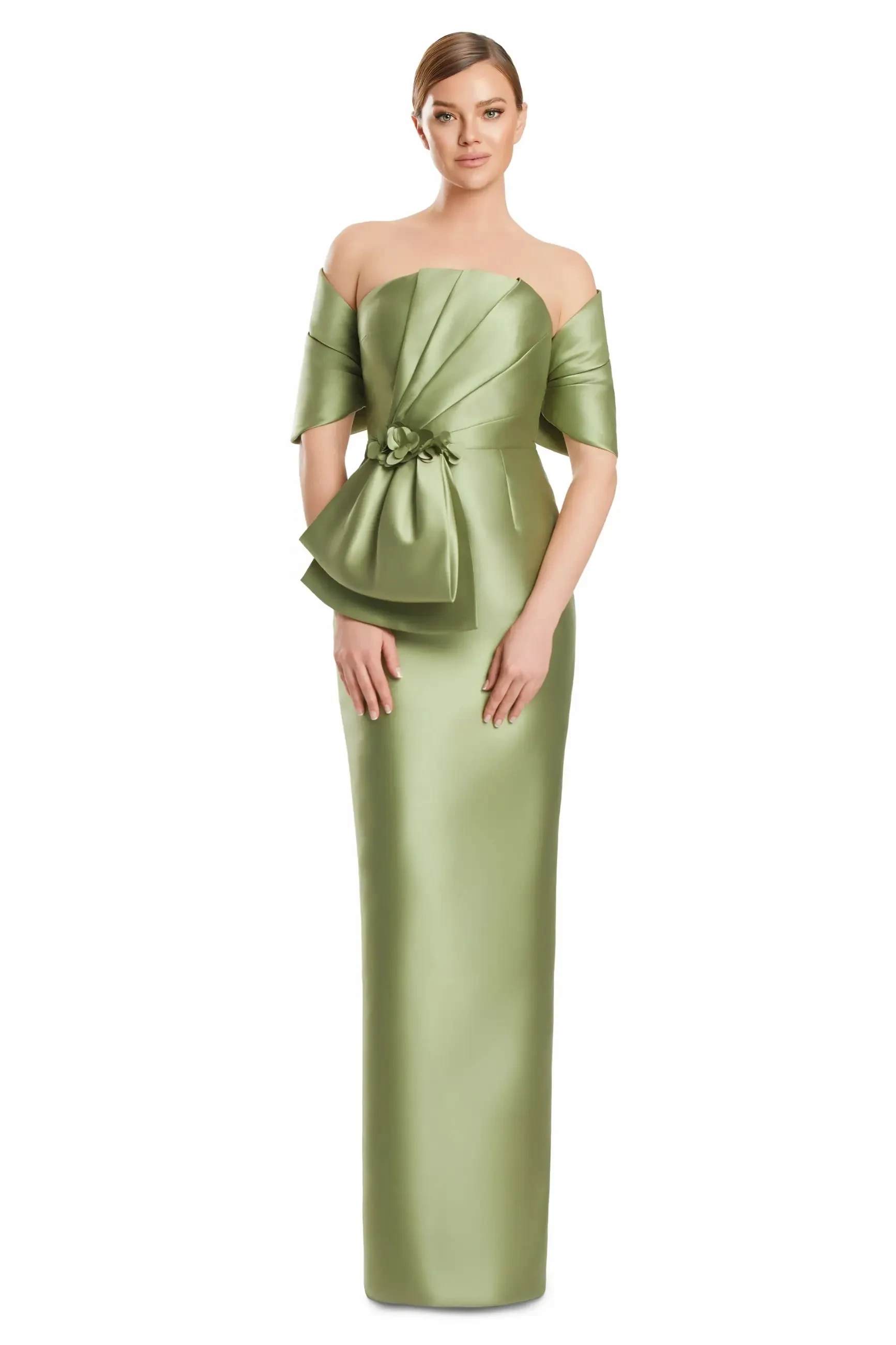 A woman in an elegant, strapless green satin gown with off-shoulder draping poses confidently. The dress features a textured bodice and a decorative floral accent, evoking sophistication and grace.