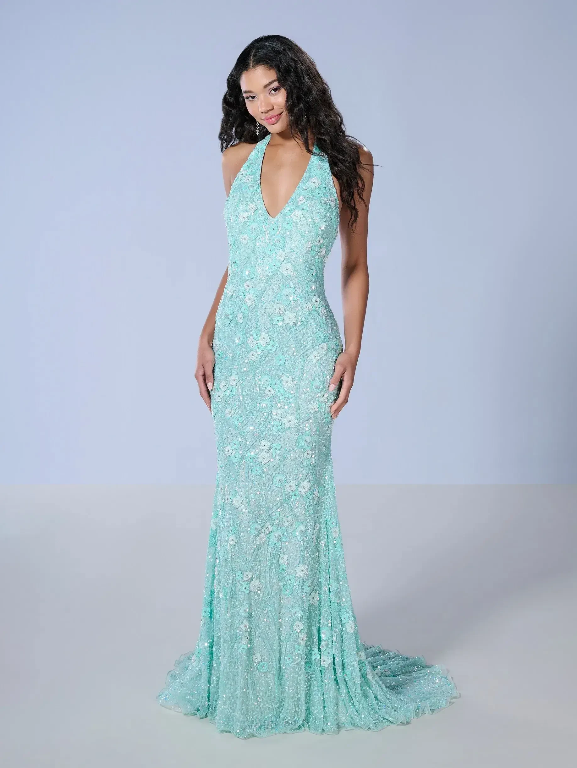 Model wearing a dress by Tiffany Designs
