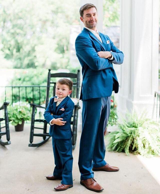 Models wearing a blue suits