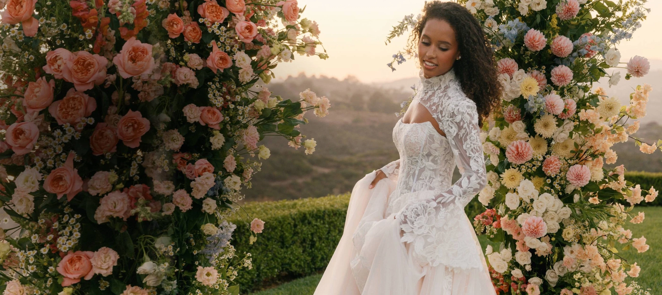 Model wearing Allure Bridals dress, desktop banner