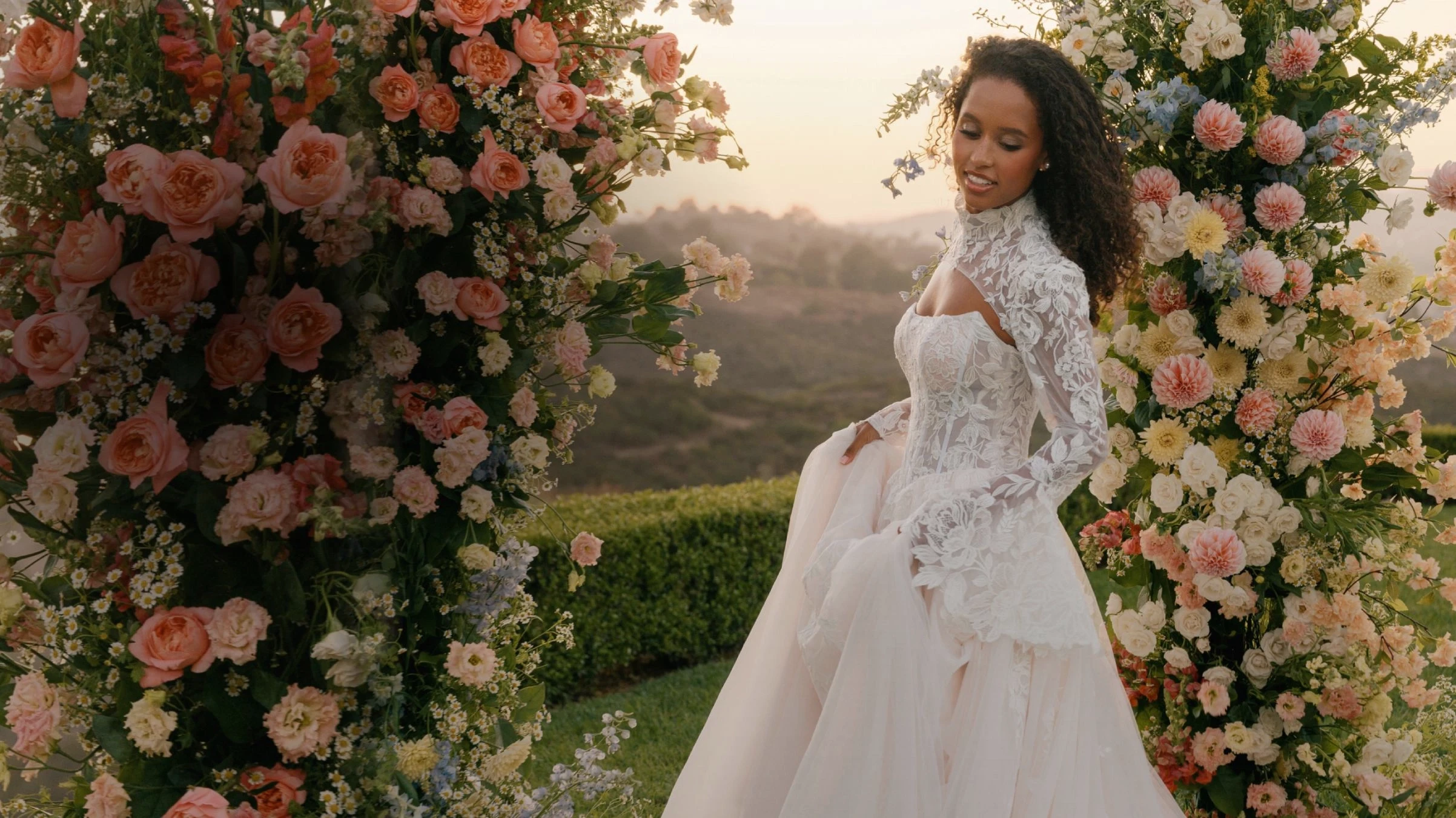 Model wearing Allure Bridals dress desktop banner