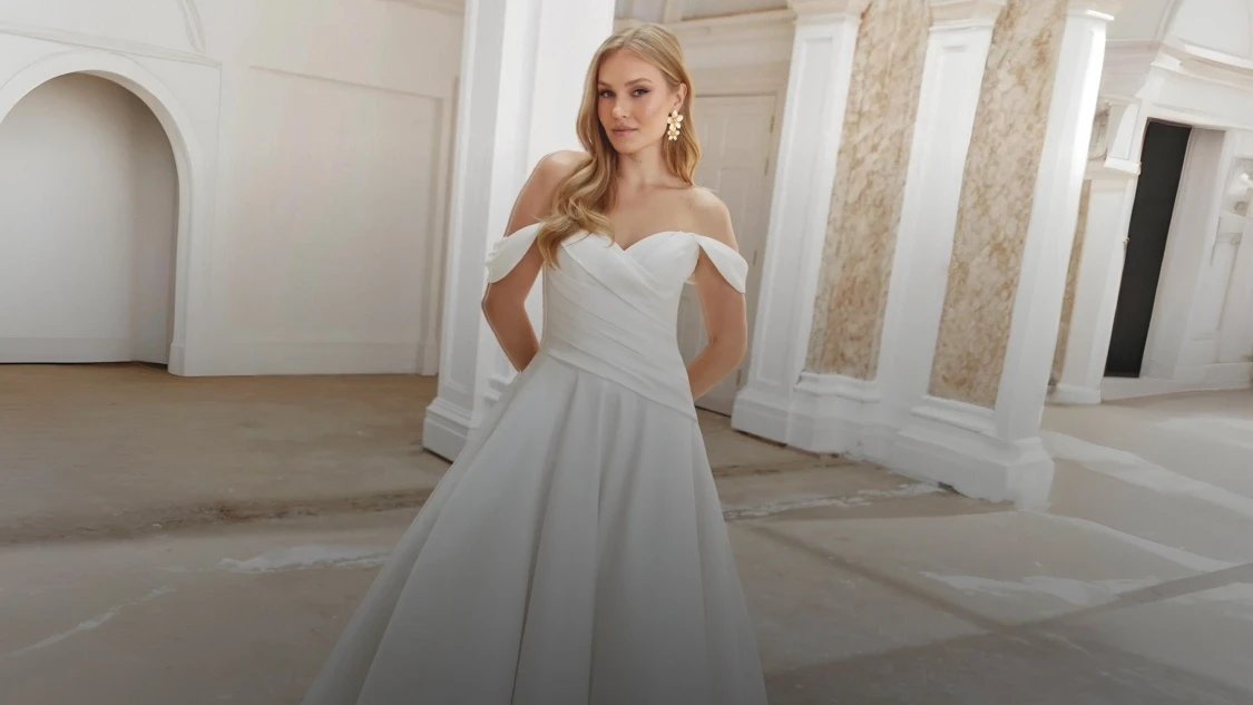 Model wearing Justin Alexander bridal dress, mobile banner